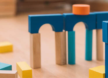 What should I use to paint toys and children's products?